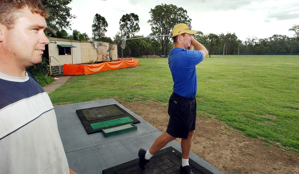 Scott Berry and Russell O'Neill playing golf, Ipswich, March 2003