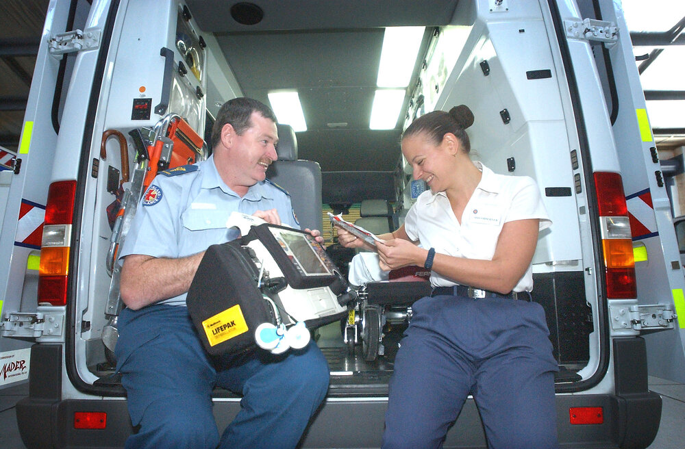 Kevin Crossingham and Sascha Knubel by an ambulance, Amberley, April 2003