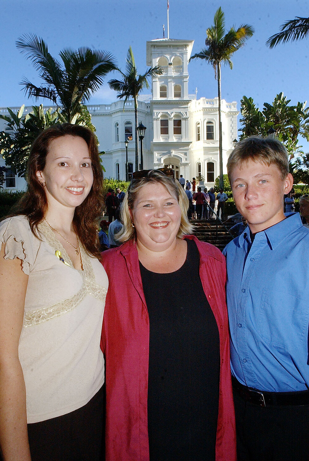 Melanie Howard, daughter of Prime Minister John Howard, with undefined people, Government House Queensland (Fernberg), Brisbane, April 2003  