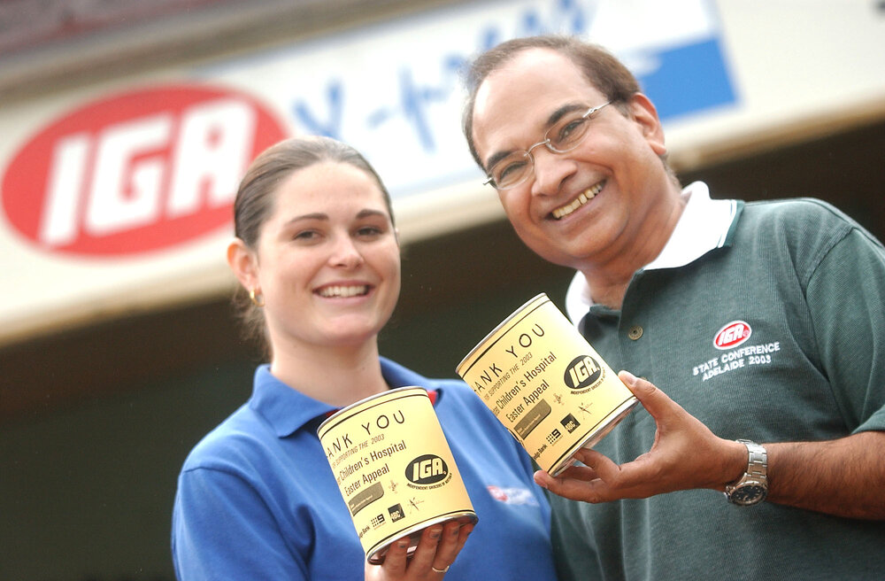 Michelle Allan and Shyam Verma outside of IGA after supporting the Children's Hospital's Easter celebration, Forest Lake, April 2003