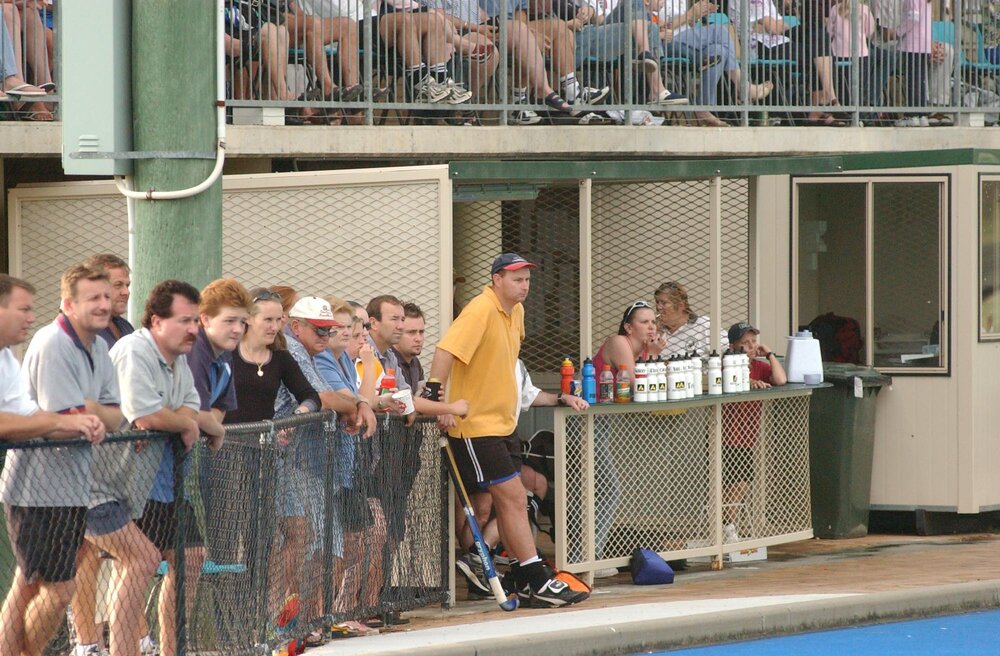 Spectators at a field hockey match, Ipswich, April 2003