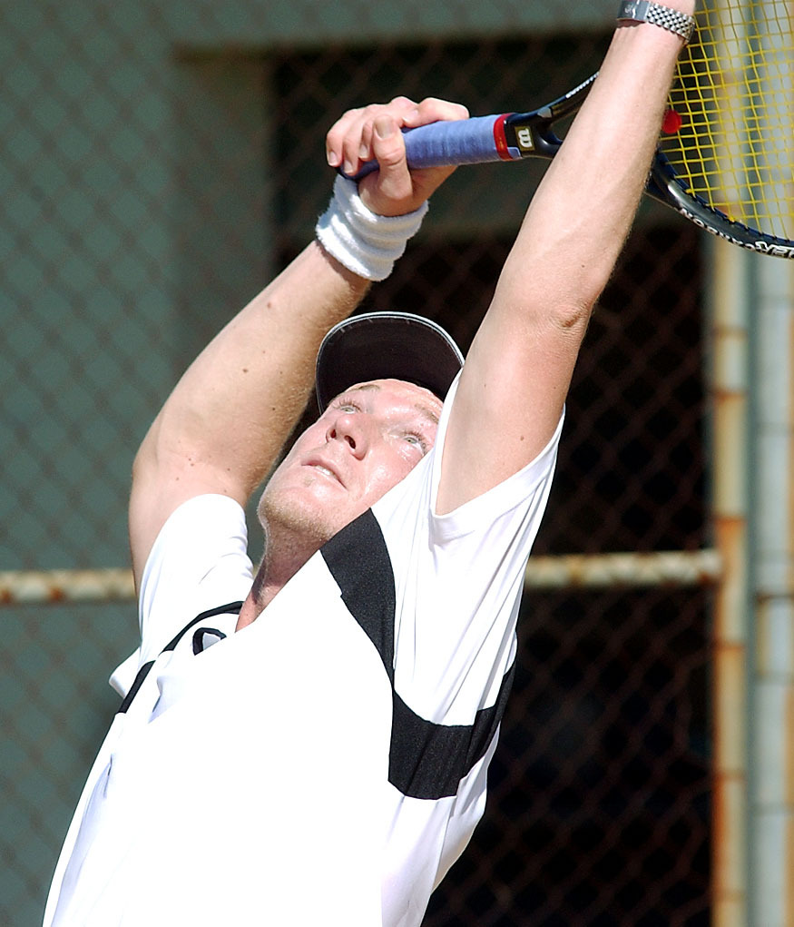 Scott Barlow, local Ipswich player in a tennis match, Ipswich, April 2003
