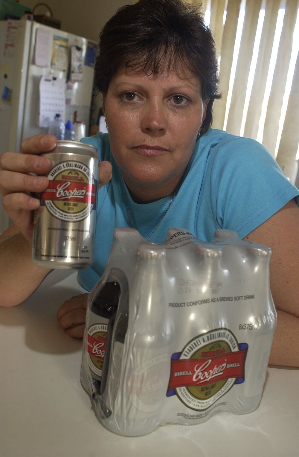 Kerry Beitzel with drinks from Cooper's Brewery, Ipswich, November 2003