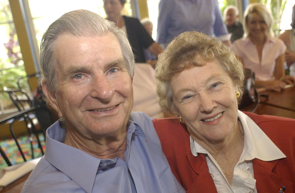 Earle and Glenis Auld attending the Woolworths Christmas party at Swags, Ipswich, November 2003