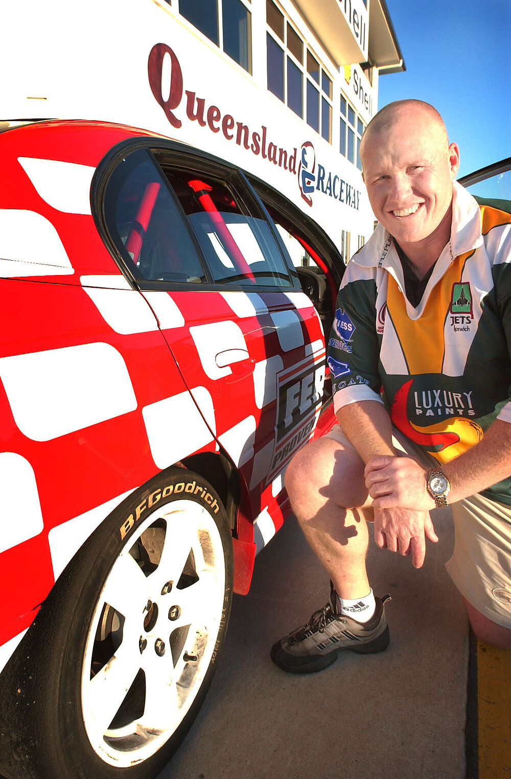 Ipswich Jets captain, Jamie Mathiou at the Queensland Raceway for a Queensland Times' fathers day promotion, Willowbank, Ipswich, August 2003