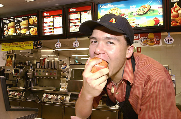 Josh Stephen eating an apple at McDonald's, Ipswich, August 2003