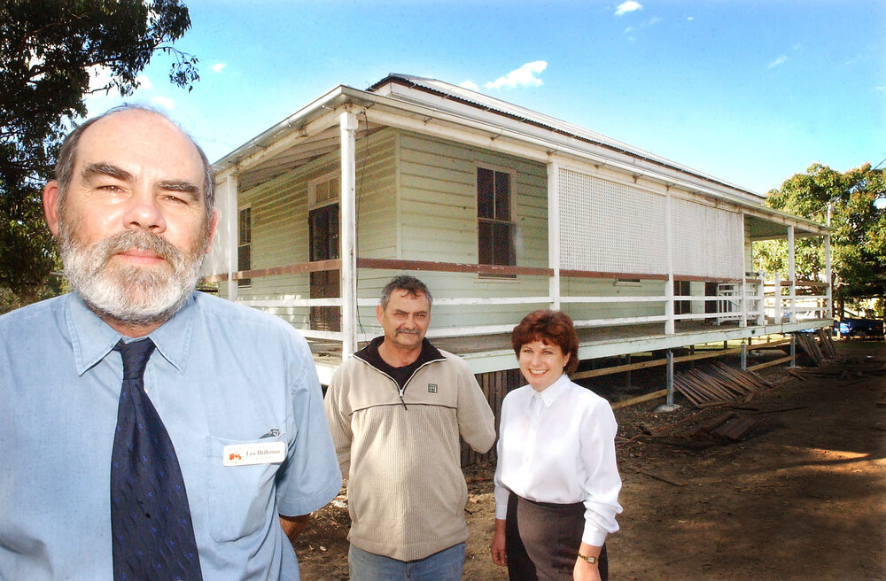 Principal of Blackstone State School, Len Heffernan, and Presidents of the Ipswich Historical Society, Ian Wilson and Jo-Ann Miller restoring the school, Ipswich, August 2003