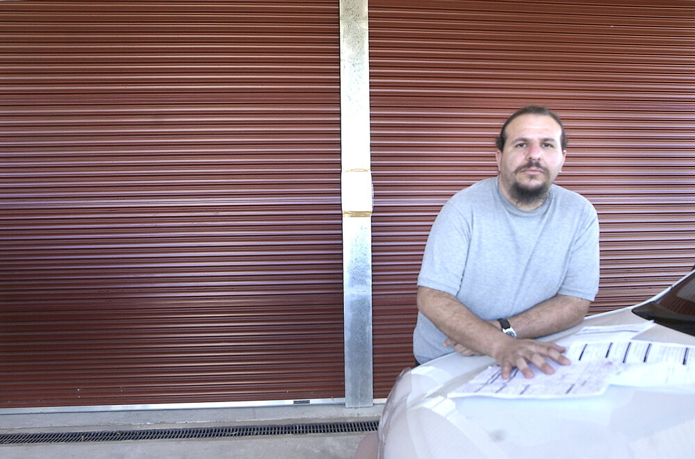 Tony Mifsud and a DIY shed, Ipswich, August 2003 