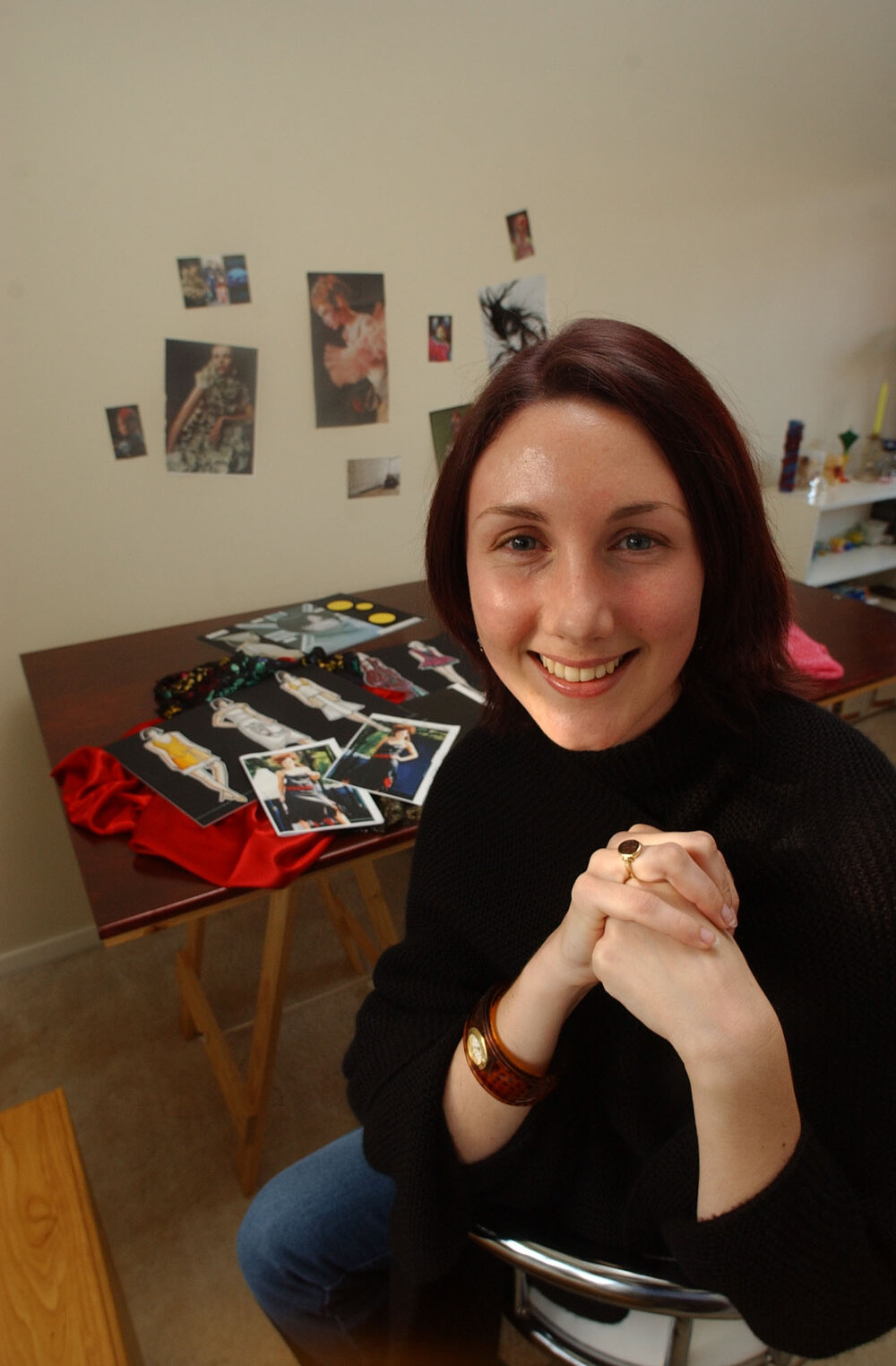 Nina with fashion design illustrations, Ipswich, August 2003