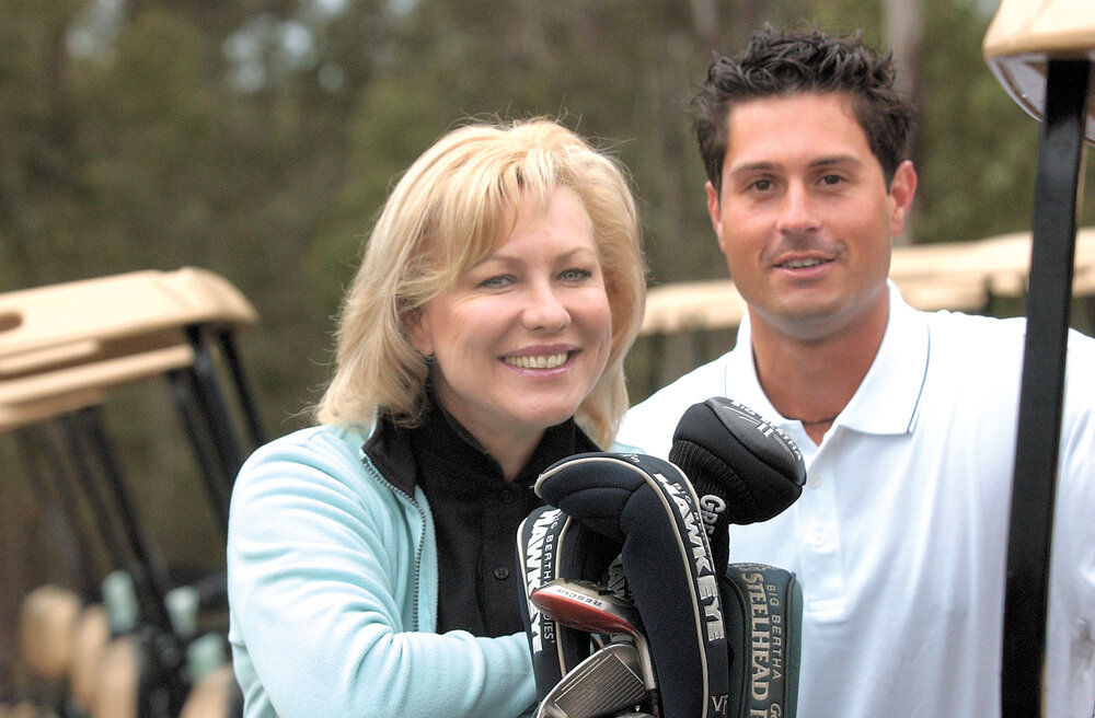 Thought to be Kerri-Anne Kennerley with unidentified man at Brookwater golf course, Brookwater, August 2003