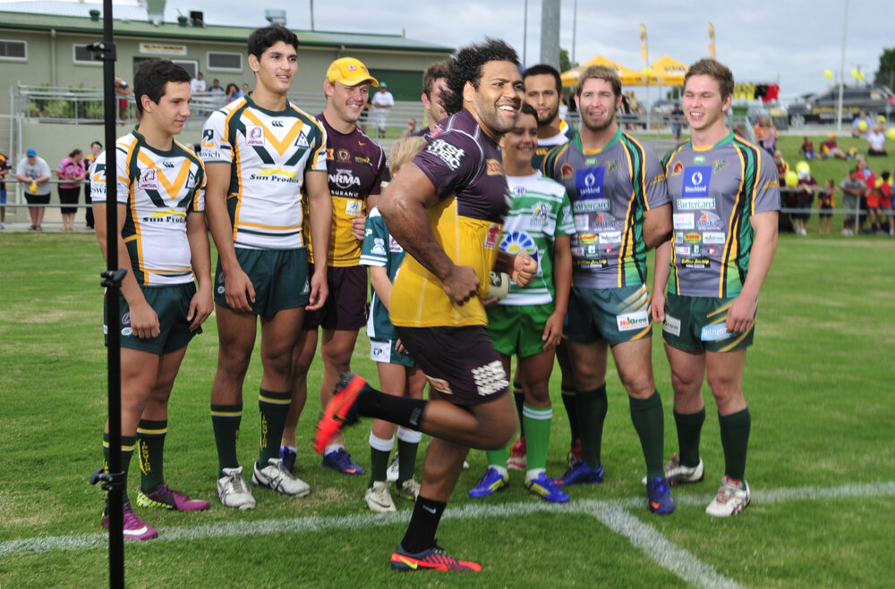 Sam Thaiday photobombs a shoot for Ipswich Rugby League after Broncos training at North Ipswich Reserve, North Ipswich, January 2013