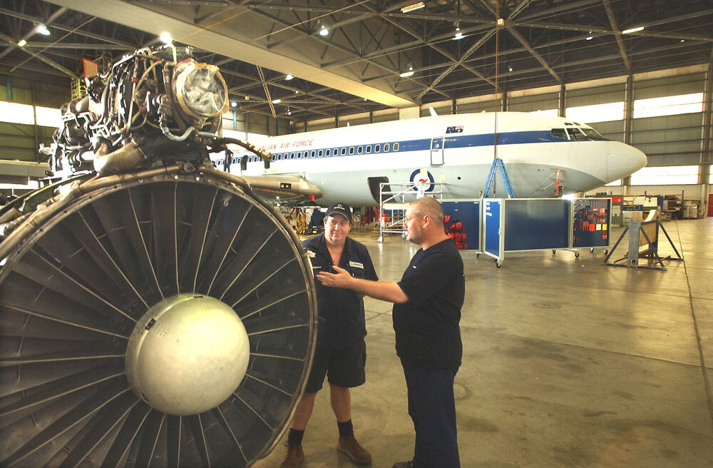 Warick Fraser and Simon Barren observing a Boeing plane from the Royal Australian Air Force, Amberley, May 2003