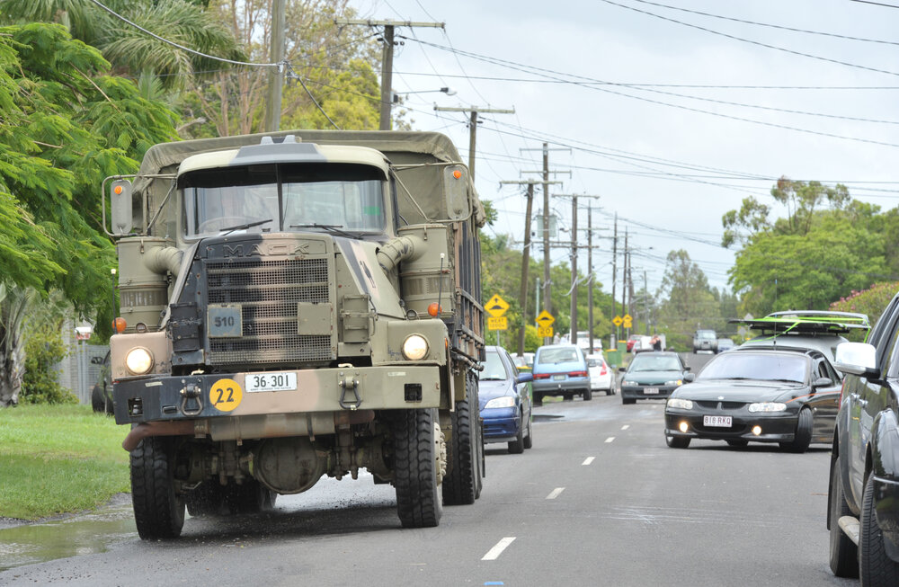 Military vehicle assisting with evacuation during flooding event, Moores Pocket, Ipswich, January 2013