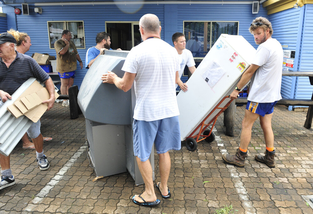 Evacuating Norths club house as flood waters rise, North Ipswich, January 2013