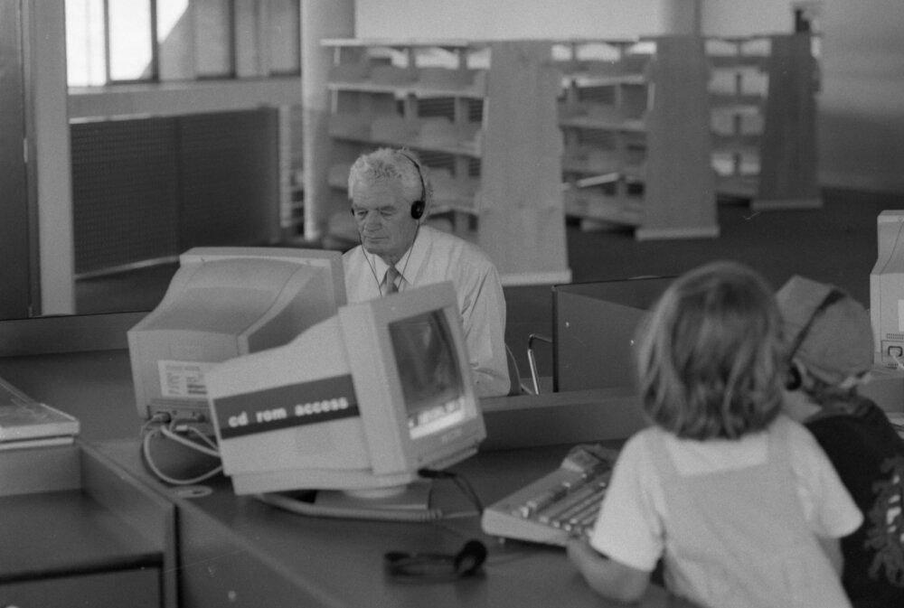 Mayor John Nugent using a computer in the South Street Ipswich City Council Library computer area, Ipswich, March 1995