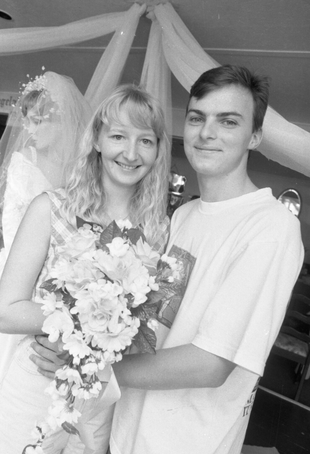 Unidentified man and woman thought to be in a bridal boutique, Ipswich, March 1995