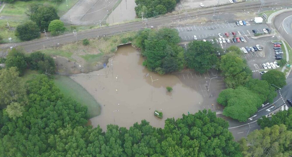 Drone images of the Bremer River in flood, northern side of Marsden Parade, Ipswich, March 2025