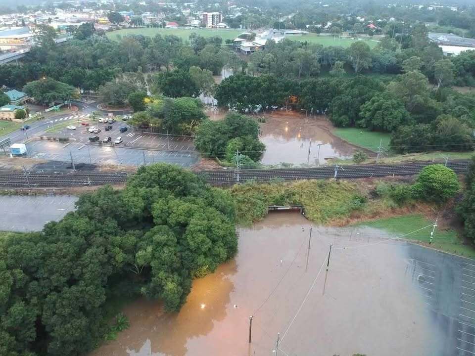 Drone image looking towards the Bremer River in flood, from Marsden Parade, Ipswich, March 2025