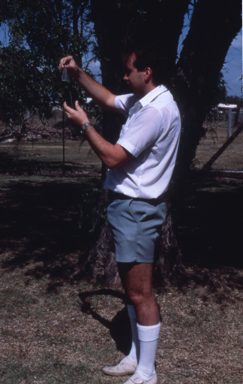 Moreton Shire Council Health Inspector testing water quality, Rosewood, c.1987