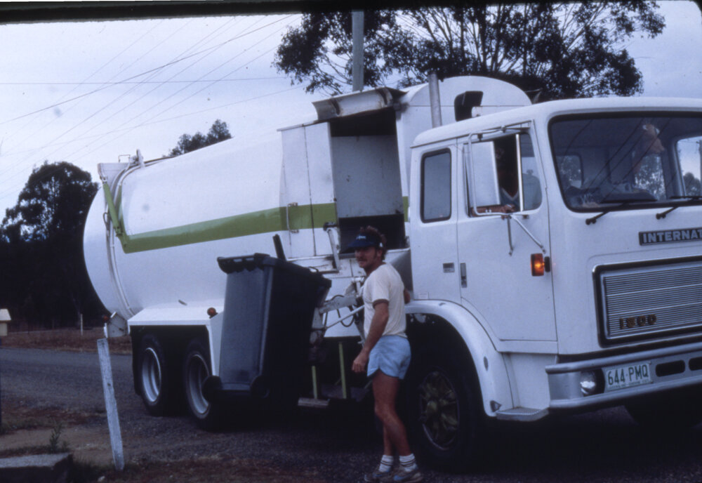 Unidentified garbage contractor working in the boundaries of the former Moreton Shire, location unknown, c.1987