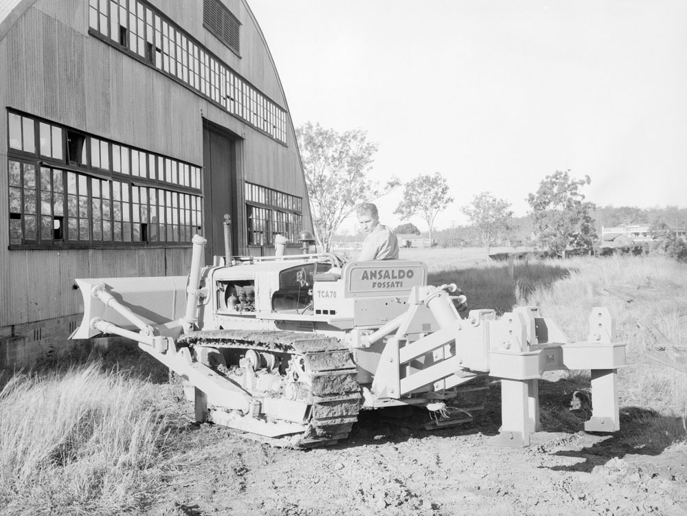 Ansaldo Fossati TCA70 Bulldozer and driver at site of old Army Depot Precinct, River Road, Redbank, Ipswich, 1954