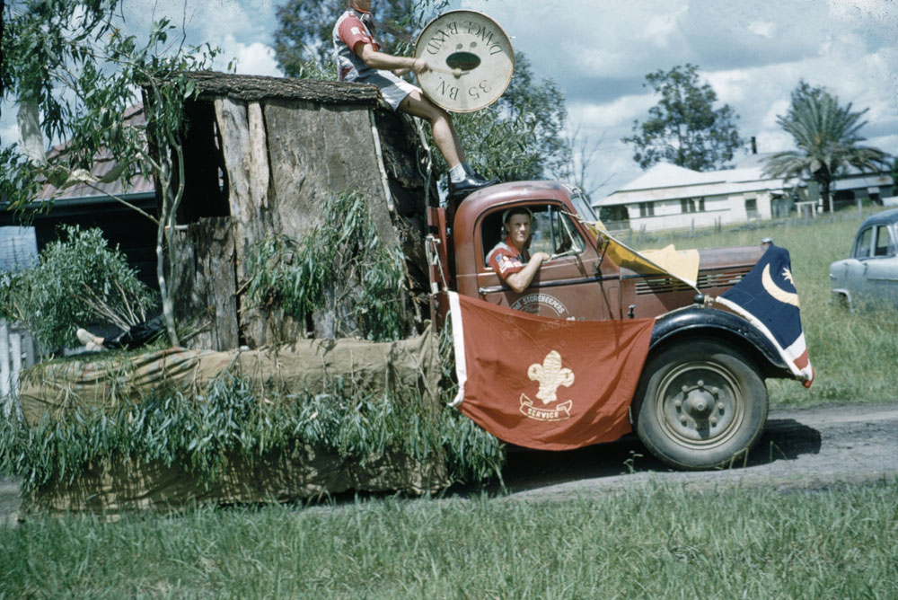 Truck being used as a float for the Rosewood Boy Scouts during procession in Rosewood, Ipswich, 1960s