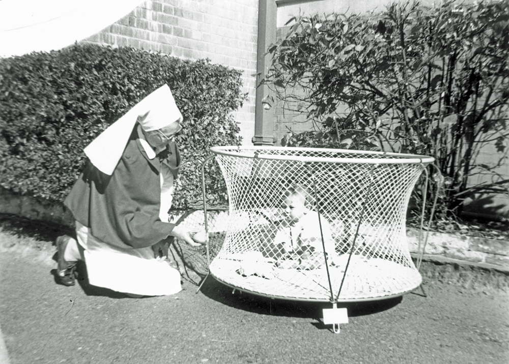 Sister Graham beside the Childrens' Ward, Ipswich General Hospital, n.d.