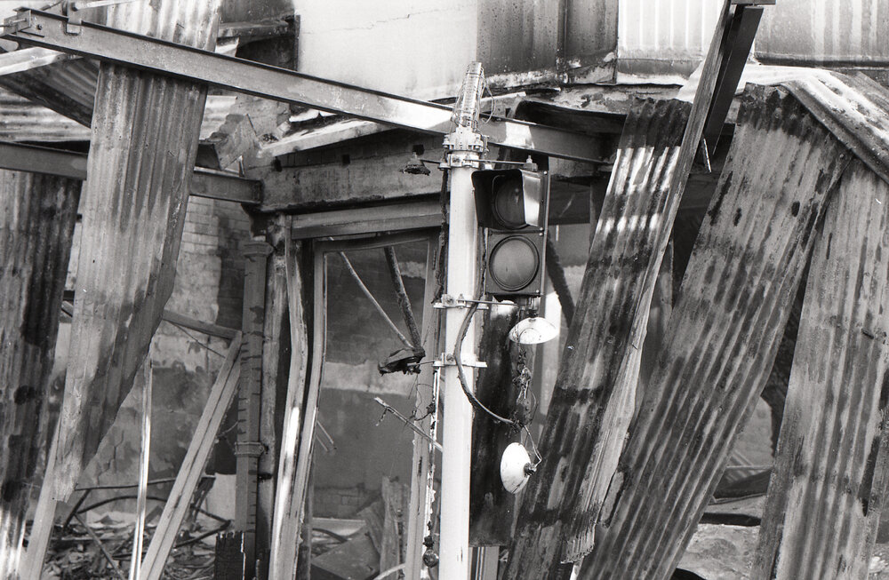 Aftermath of the Reid's (Cribb &amp; Foote) fire, corner of Brisbane and Bell Streets, Ipswich, August 1985