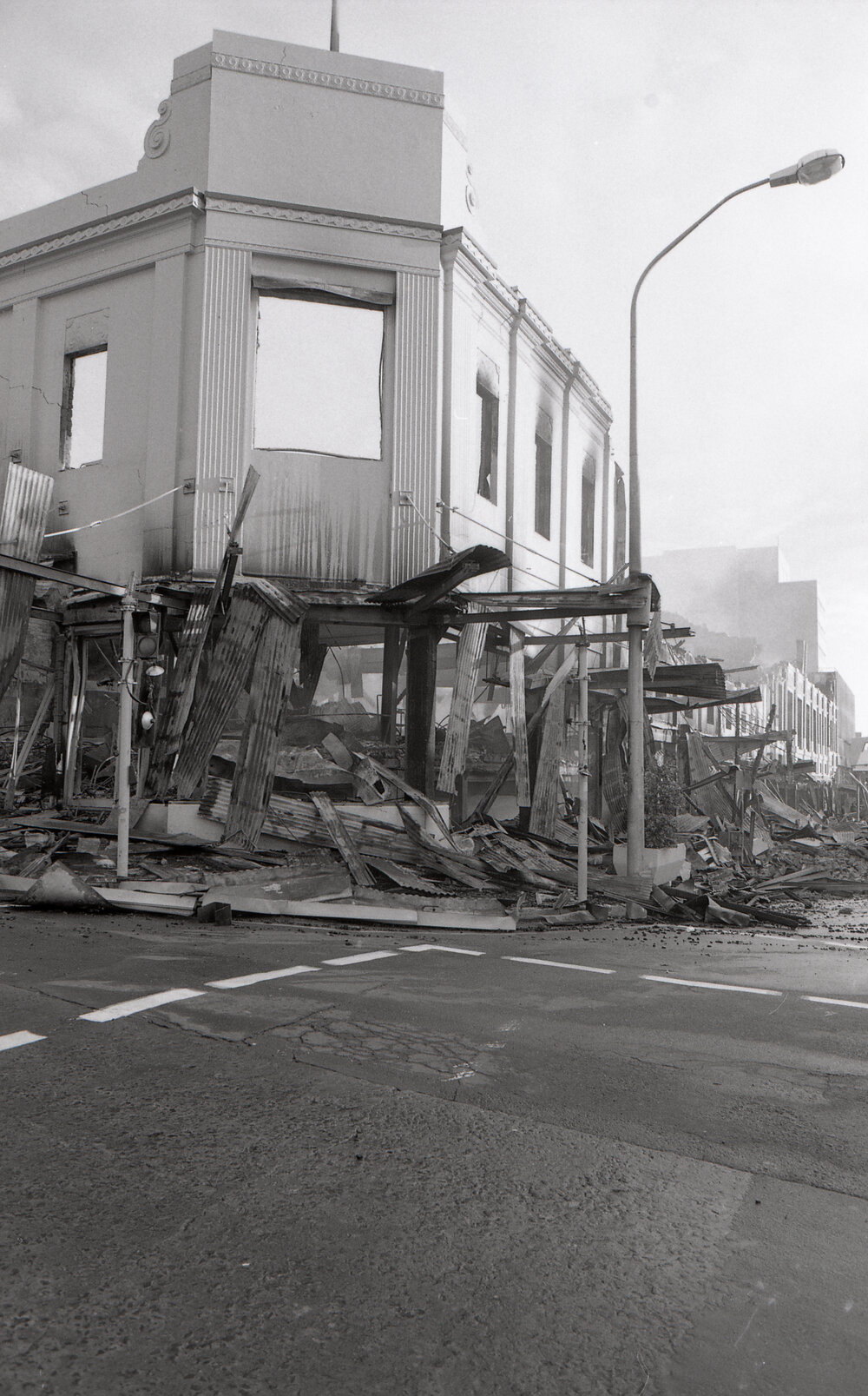 Aftermath of the Reid's (Cribb &amp; Foote) fire, corner of Brisbane and Bell Streets, Ipswich, August 1985
