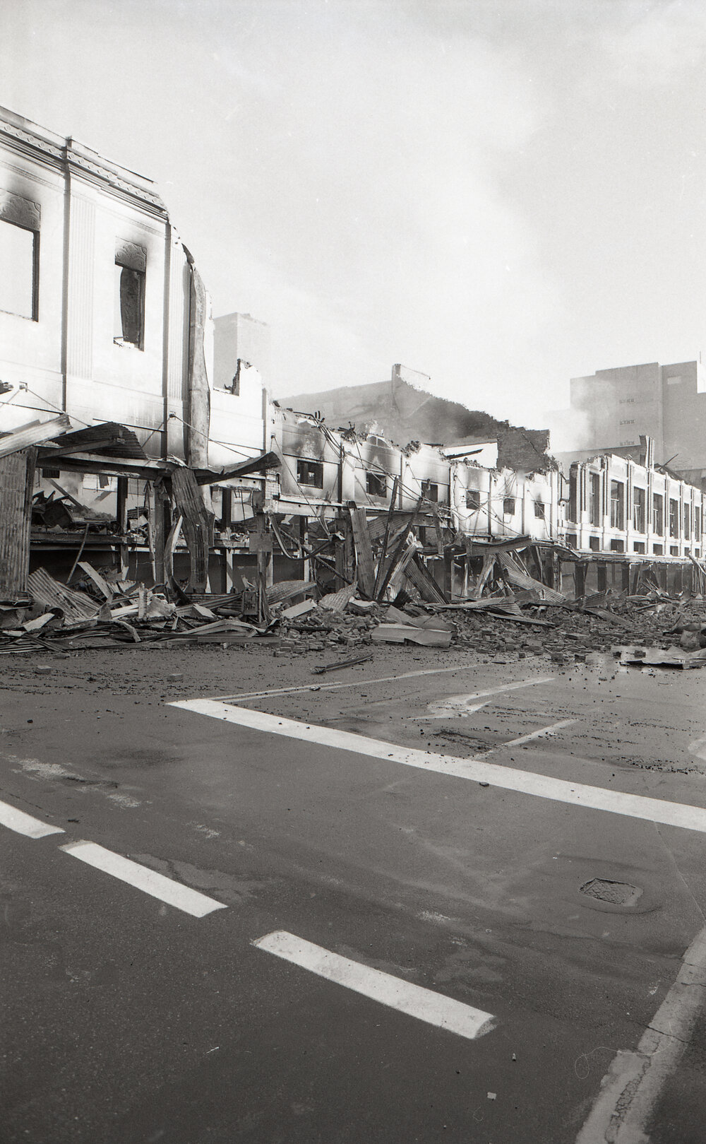 Aftermath of the Reid's (Cribb &amp; Foote) fire, corner of Brisbane and Bell Streets, Ipswich, August 1985