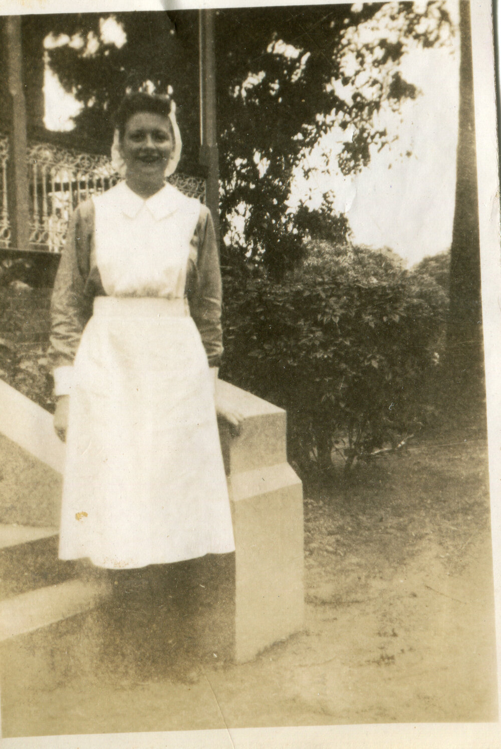 Nurse June Green on the steps of the Jubilee Building, Ipswich Hospital, Ipswich, 1940s