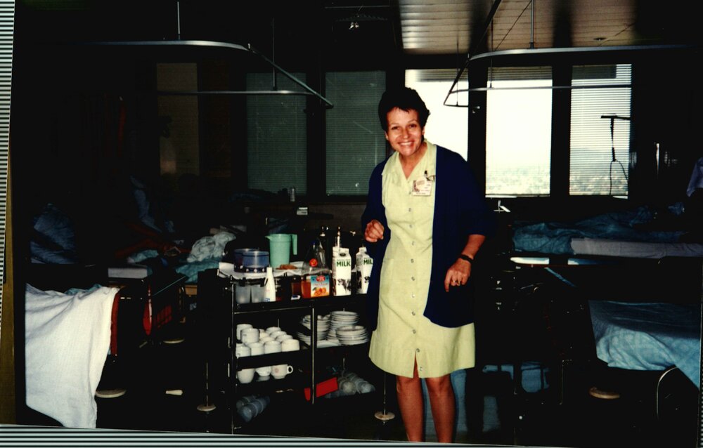 Domestic staff with tea trolley,