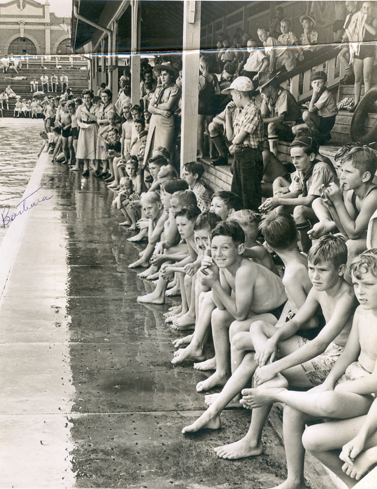 Cubs and Cub leaders from Rosewood, at the swimming baths in Ipswich, c.1951