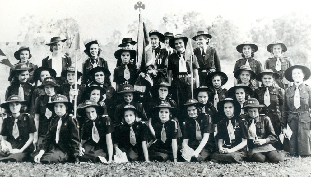 Girl guides from 1st Ipswich group at the first enrolment after re-opening after World War 2, Ipswich, 1945