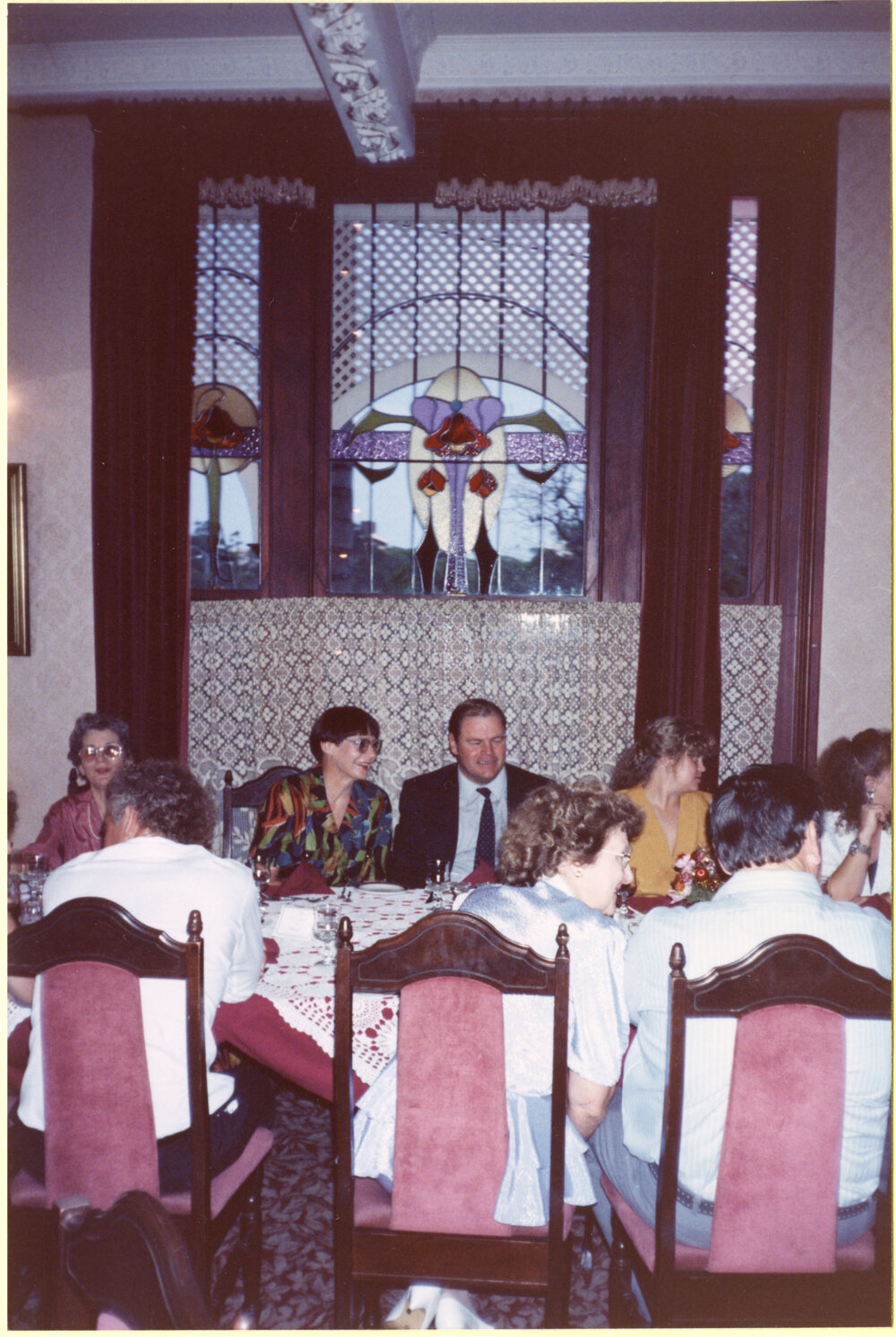 Library staff, and partners, attending Christmas celebrations, Petrie Mansions Restaurant, Brisbane, December 1990