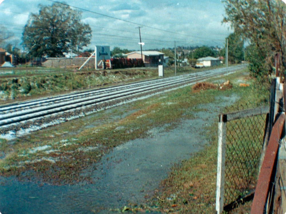 Railway line covered in hail, Booval, Ipswich, 1987