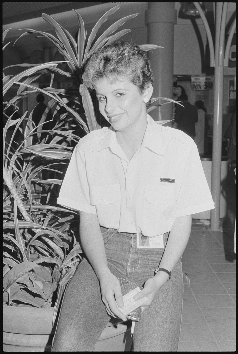 Unidentified teenager wearing a Student Council badge at the grand opening of Redbank Plaza Shopping Centre, Redbank, September 1985