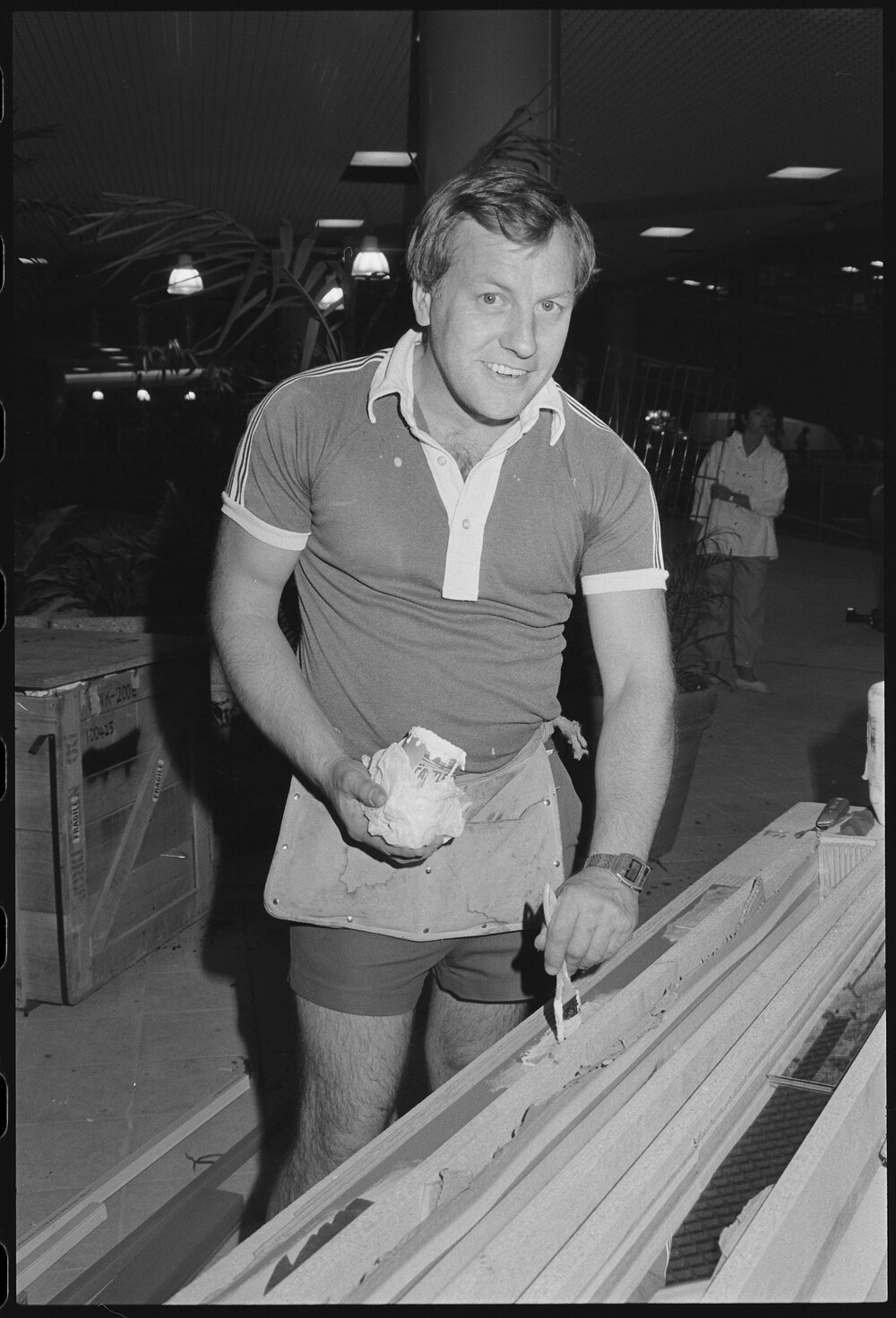 Unidentified workman painting in Redbank Plaza Shopping Centre during construction, Redbank, September 1985