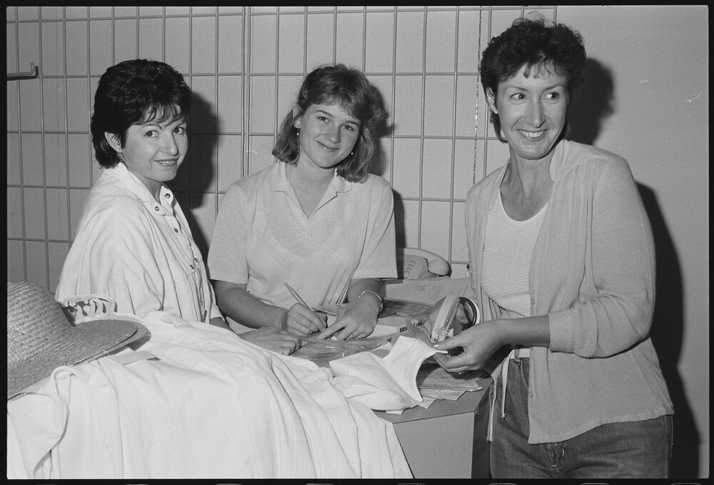 Three unidentified women working in Redbank Plaza Shopping Centre during construction, Redbank, September 1985