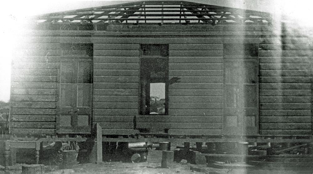 West End Cash Store during demolition, Brisbane Street, West Ipswich, mid 1950s