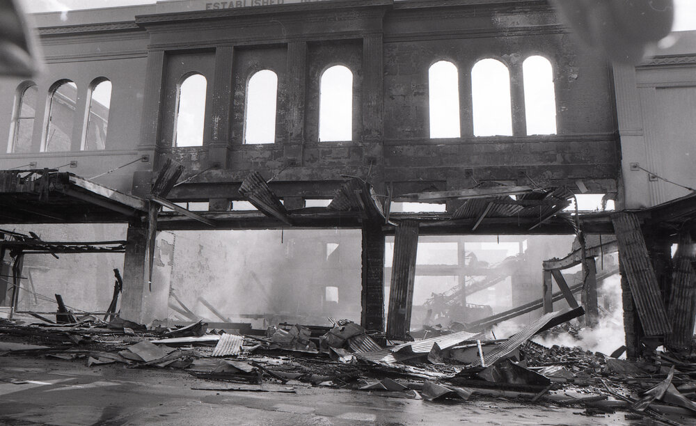 Aftermath of the Reid's (Cribb &amp; Foote) fire, Brisbane Street, Ipswich, August 1985