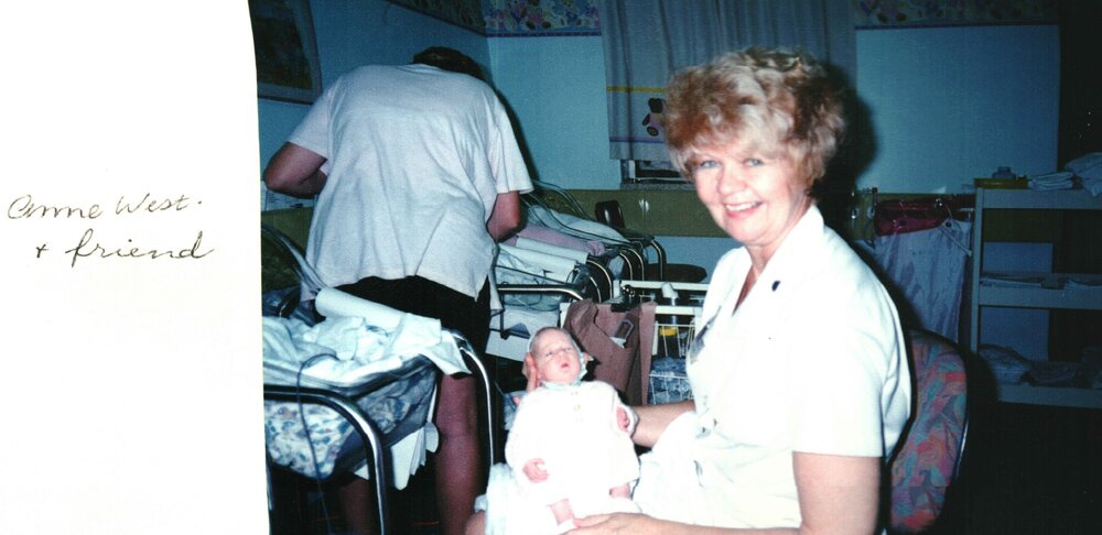 MIDWIFERY Scrapbook 1991 TO 1998, Anne West holding baby, c1995