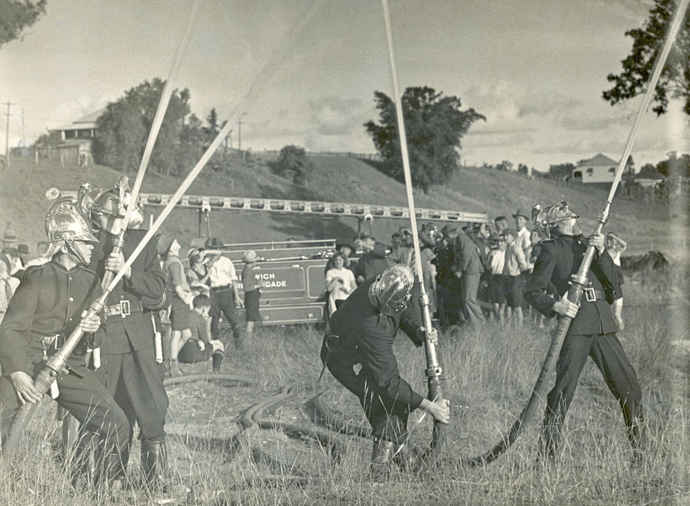 Firefighters giving a demonstration of their hoses, Ipswich, mid 1940s