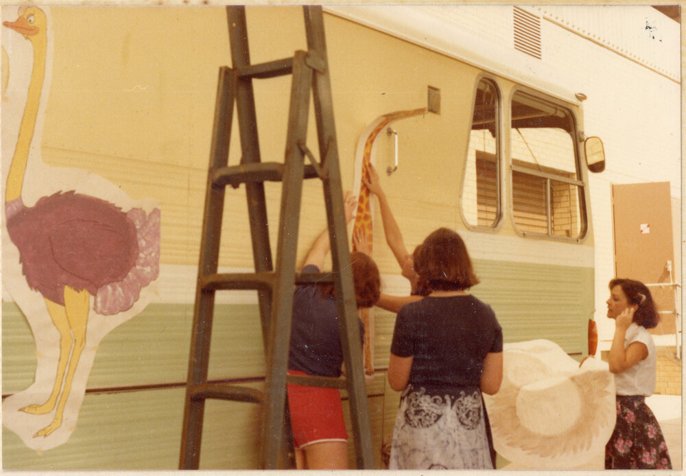 Decorating the Bookmobile as a "Library Zoo" for a parade, Ipswich, c.1980