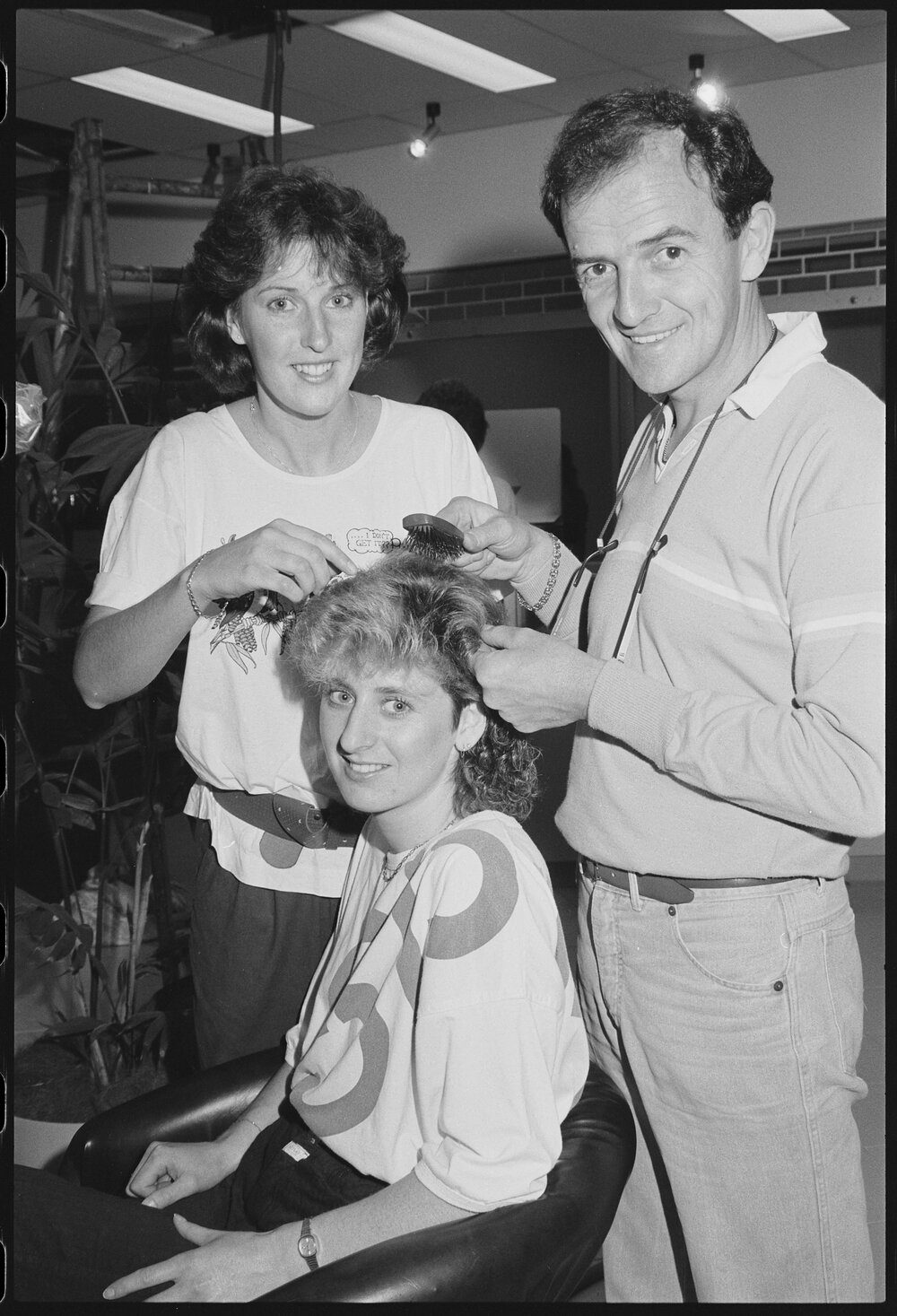 Unidentified people in a salon in Redbank Plaza Shopping Centre during construction, Redbank, September 1985