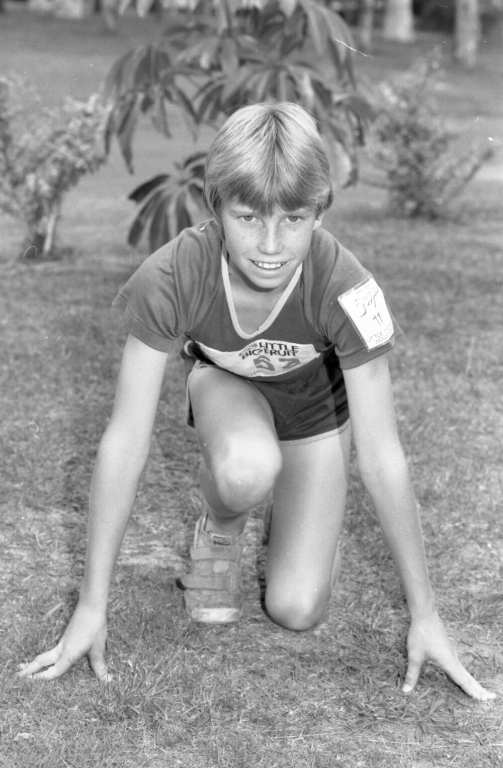 Unidentified boy wearing Little Athletics Association uniform, Ipswich, Queensland, September 1985