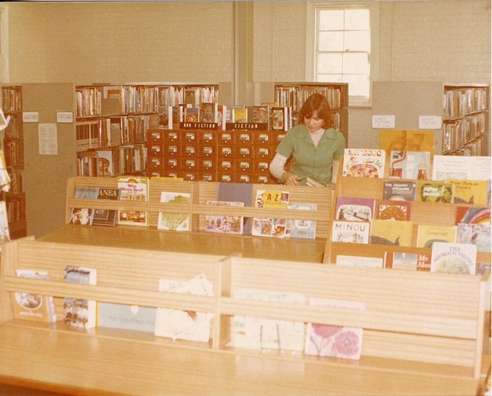 Librarian Irene Elliot, in the children's section, Ipswich Municipal Library, corner Nicholas and Limestone Streets, Ipswich, 1970s