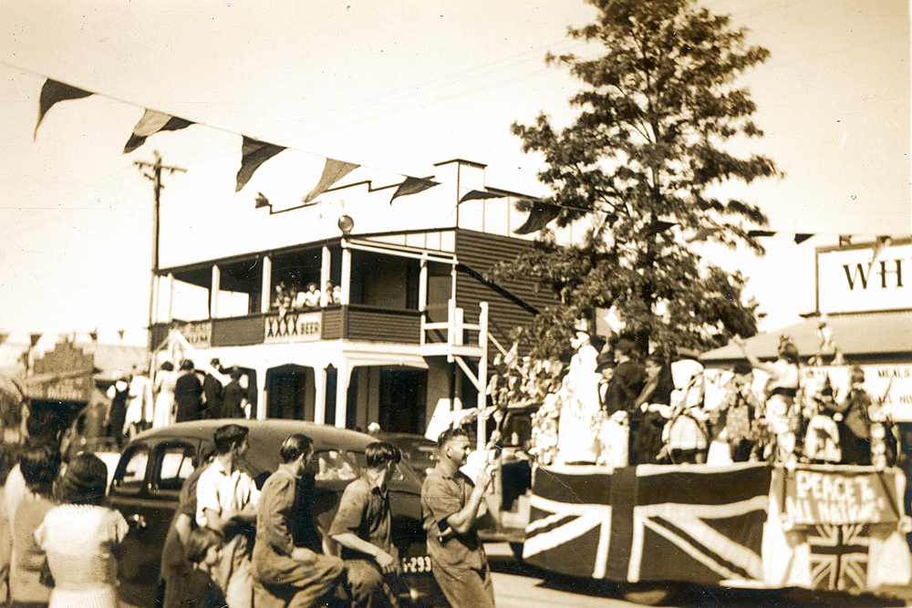 Procession past Royal George Hotel, Rosewood, Ipswich, c.1950