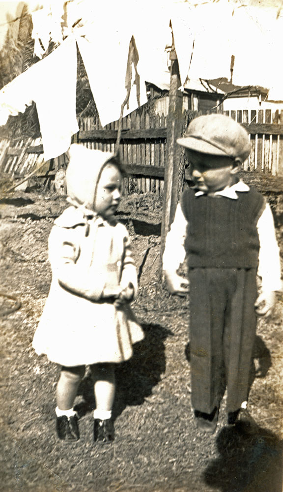 Unidentified children in the backyard of a home at West Ipswich, early 1950s