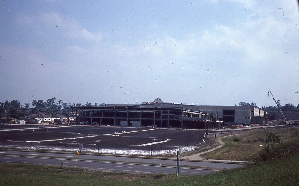 Collingwood Drive and late stages of construction of Redbank Plaza Shopping Centre, Redbank, Ipswich, c.1985